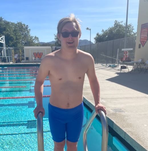 Special Olympics swimmer Owen Ostergard joins WHS swim team
