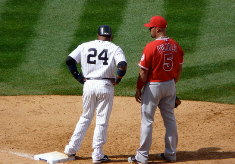 BASEBALL LEGENDS: Albert Pujols (right) and Robinson Canó (left) stand near second base at Yankee Stadium on April 14, 2012, chatting in-between pitches. Canó has been playing major league baseball for 17 seasons, and Pujols has been a part of the MLB for 22 seasons. Pujols is expected to retire from the MLB after the 2022 season. While Canó has not announced retirement yet, he is currently not officially signed to an MLB team, after being released from the New York Mets during the 2022 season.