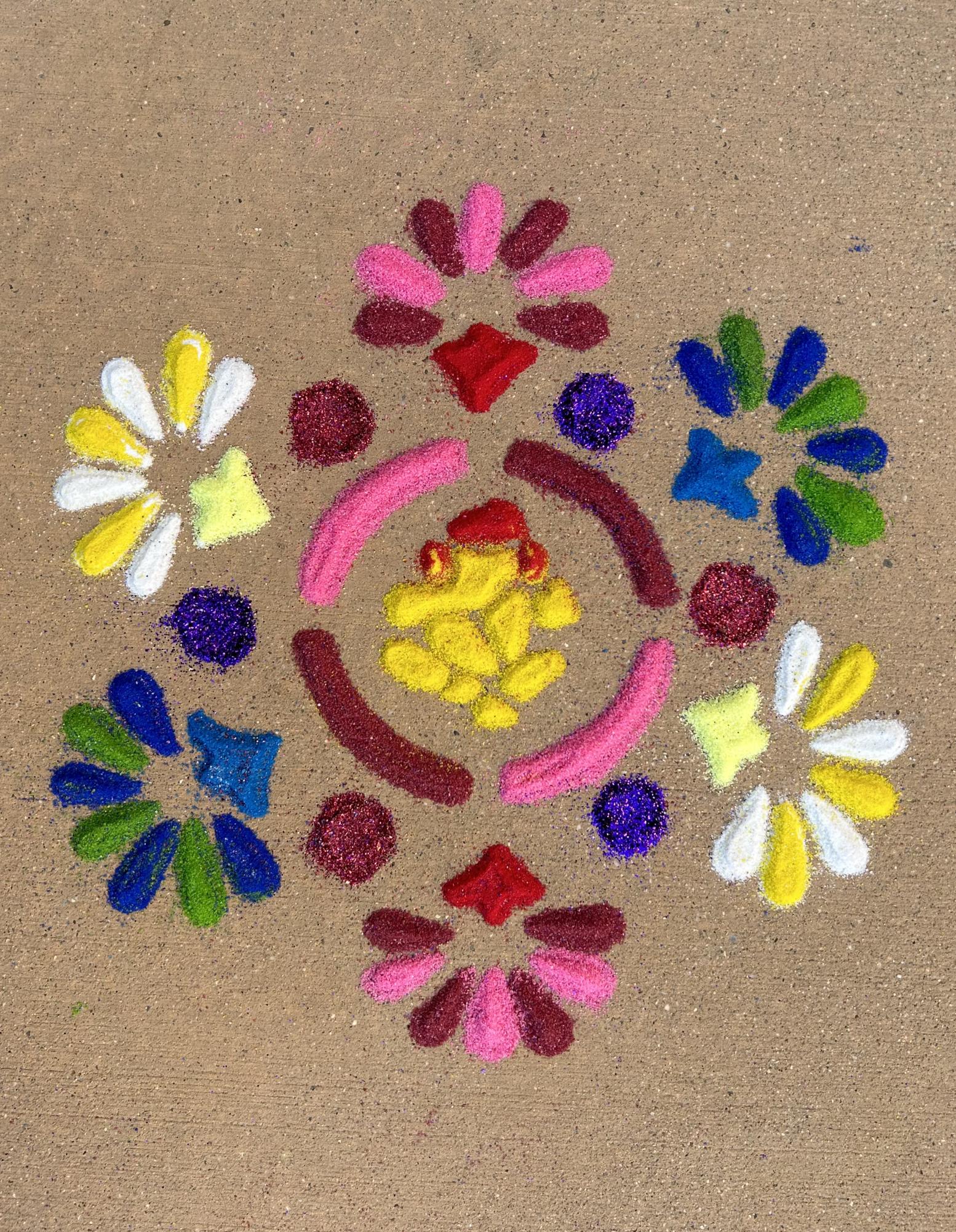 Rangolis are popular Diwali decorations made of colored sand. The designs, often formed near the entrance to a home, feature flowers, symmetrical designs and religious symbols in vibrant hues to welcome God and abundance inside. 