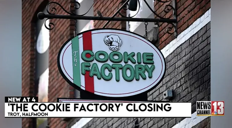 Cookie Factory cookies displayed in a retail bakery case